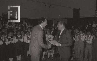 Presentación del coro juvenil en la Escuela Normal